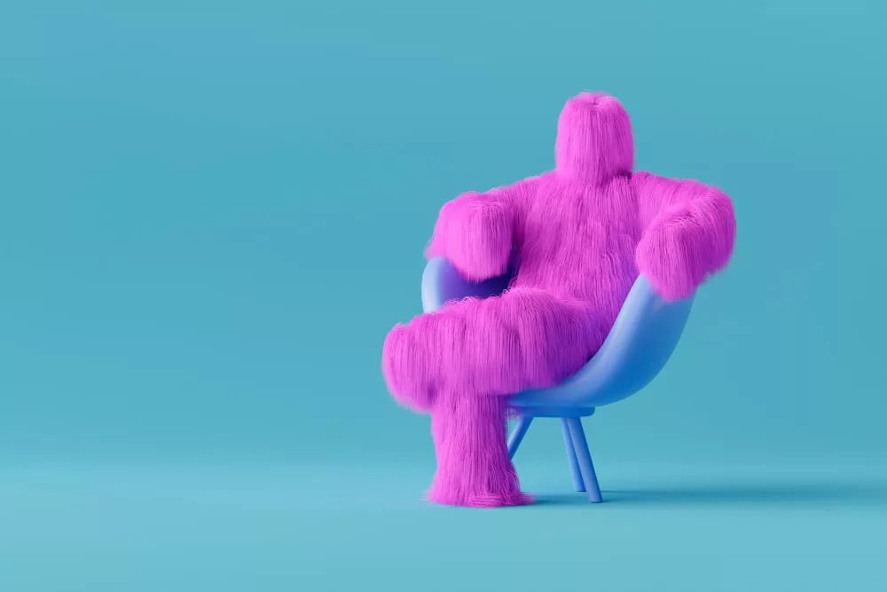 purple-yeti-cartoon-sitting-chair